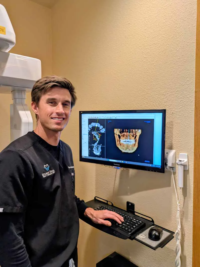 Dr. Beelman looking at a restorative dentistry scan