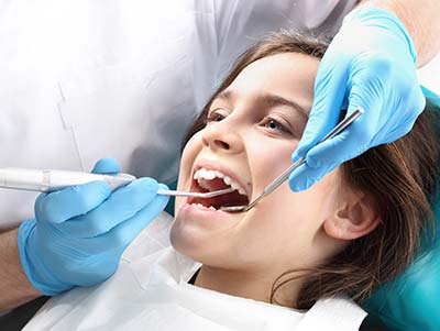 child receiving dental care in Bedford, TX